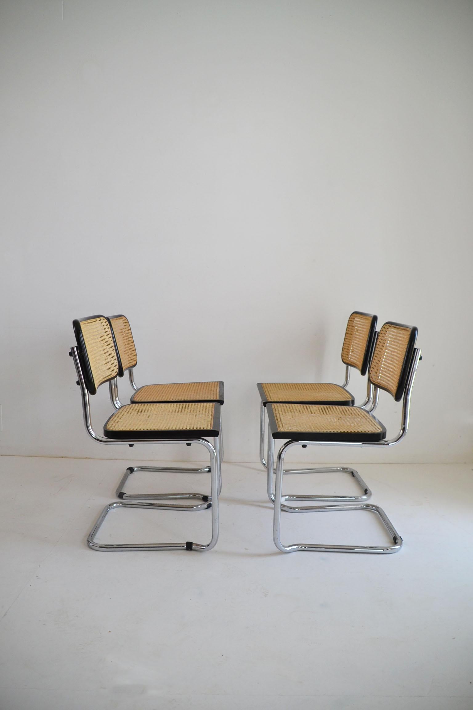 Set of six midcentury Italian Cesca Marcel Breuer B32 stackable modern chairs, 1970.
Chrome tubular structure, beechwood frames lacquered in black and Viennese natural grid.