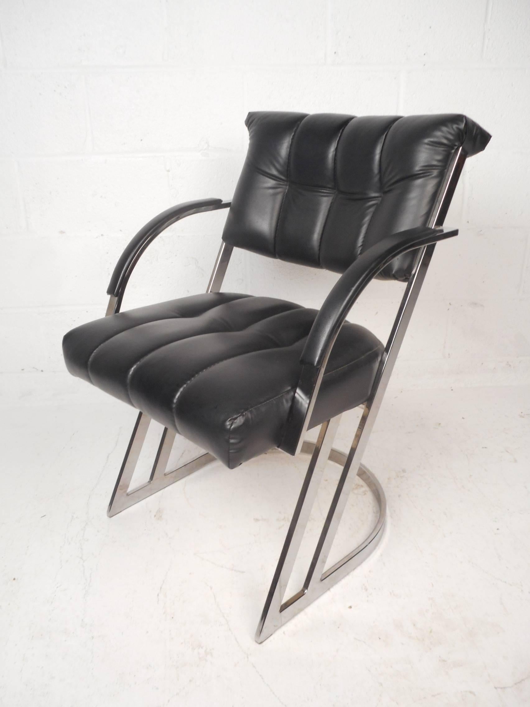 This gorgeous set of four vintage modern chairs feature a heavy cantilever chrome frame with padded armrests. A sleek design with an overstuffed seat and backrest ensuring optimal comfort without sacrificing style. The arch shaped arm rests and