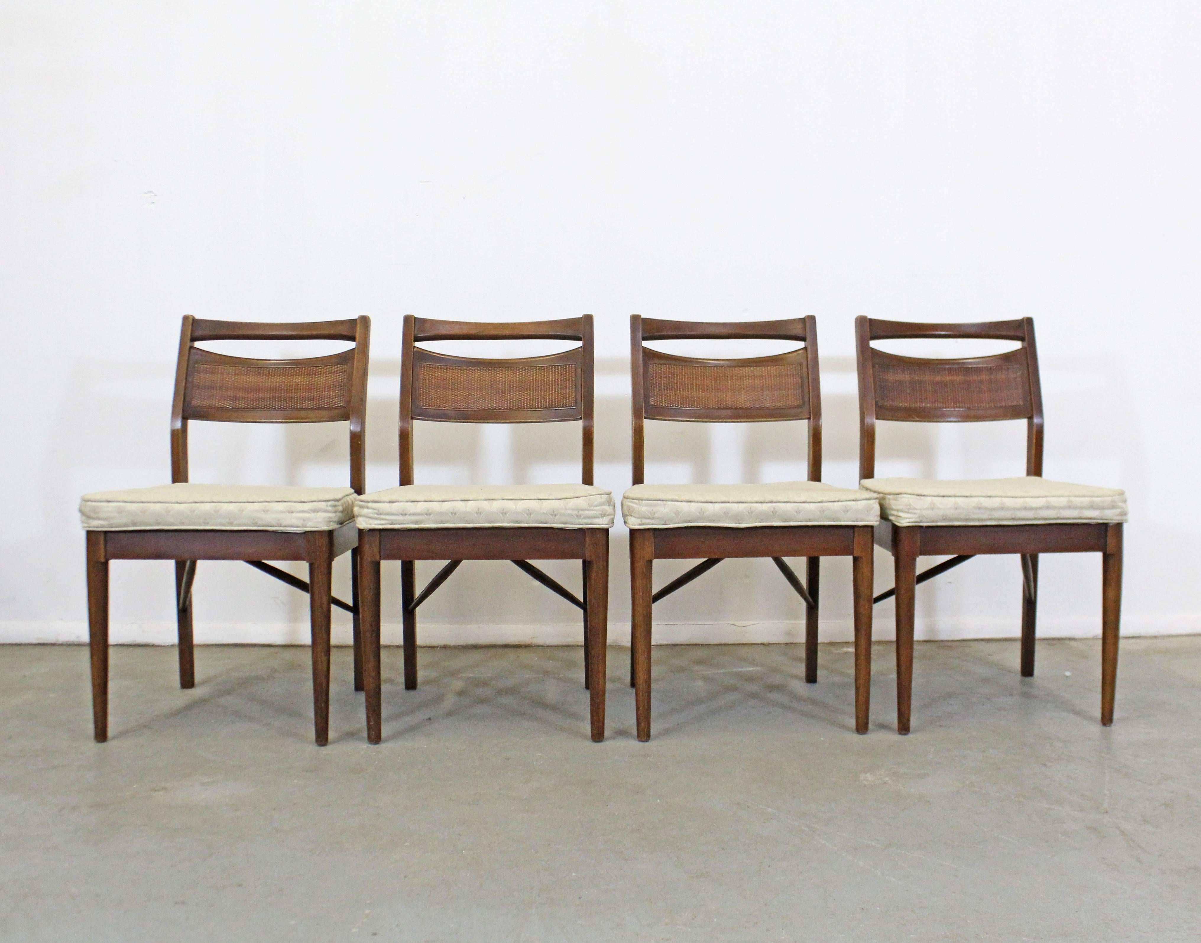 What a find. Offered is a vintage mid-century modern chair set by American of Martinsville. They are made of walnut with caned backs and upholstered seats. They are in structurally sound condition, showing normal age wear including stains on the