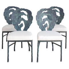 Ensemble de quatre chaises en feuilles de bananier de style moderne du milieu du siècle dernier