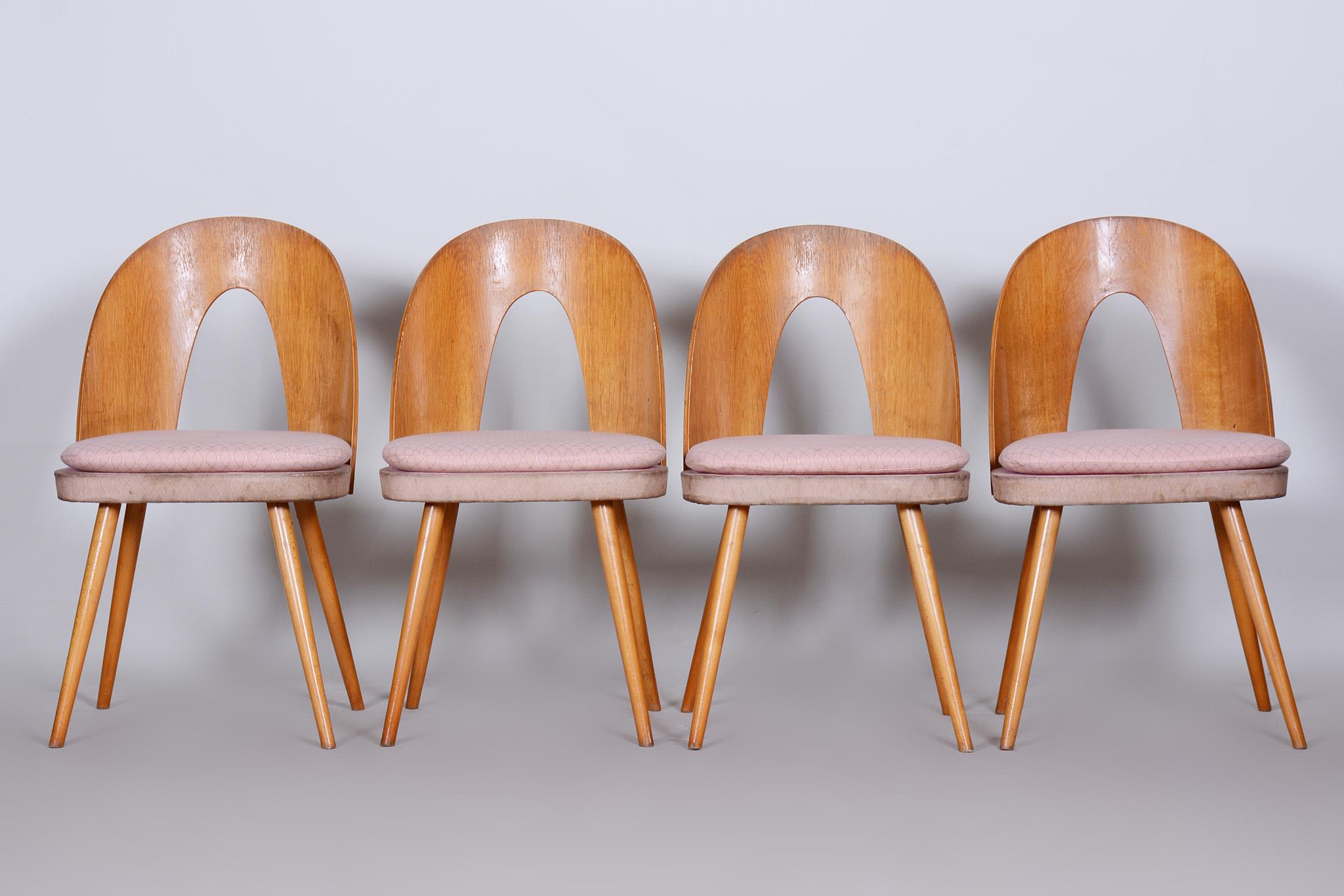 Set of four Mid-Century Modern chairs made in 1950s Czechia by Antonín Šuman

In pristine original condition, the upholstery has been professionally cleaned and its polish revived by our refurbushing team in Czechia. 

You can find a set of