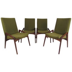 Ensemble de quatre chaises à manger modernes du milieu du siècle dernier par John Stuart