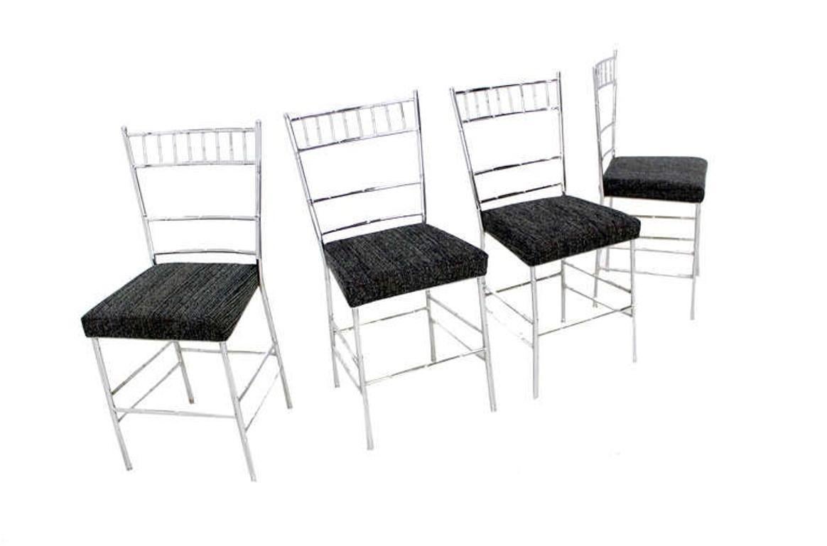 Set of Four Mid-Century Modern Faux Bamboo Chrome Designer Dining Chairs MINT! 
New Upholstery.