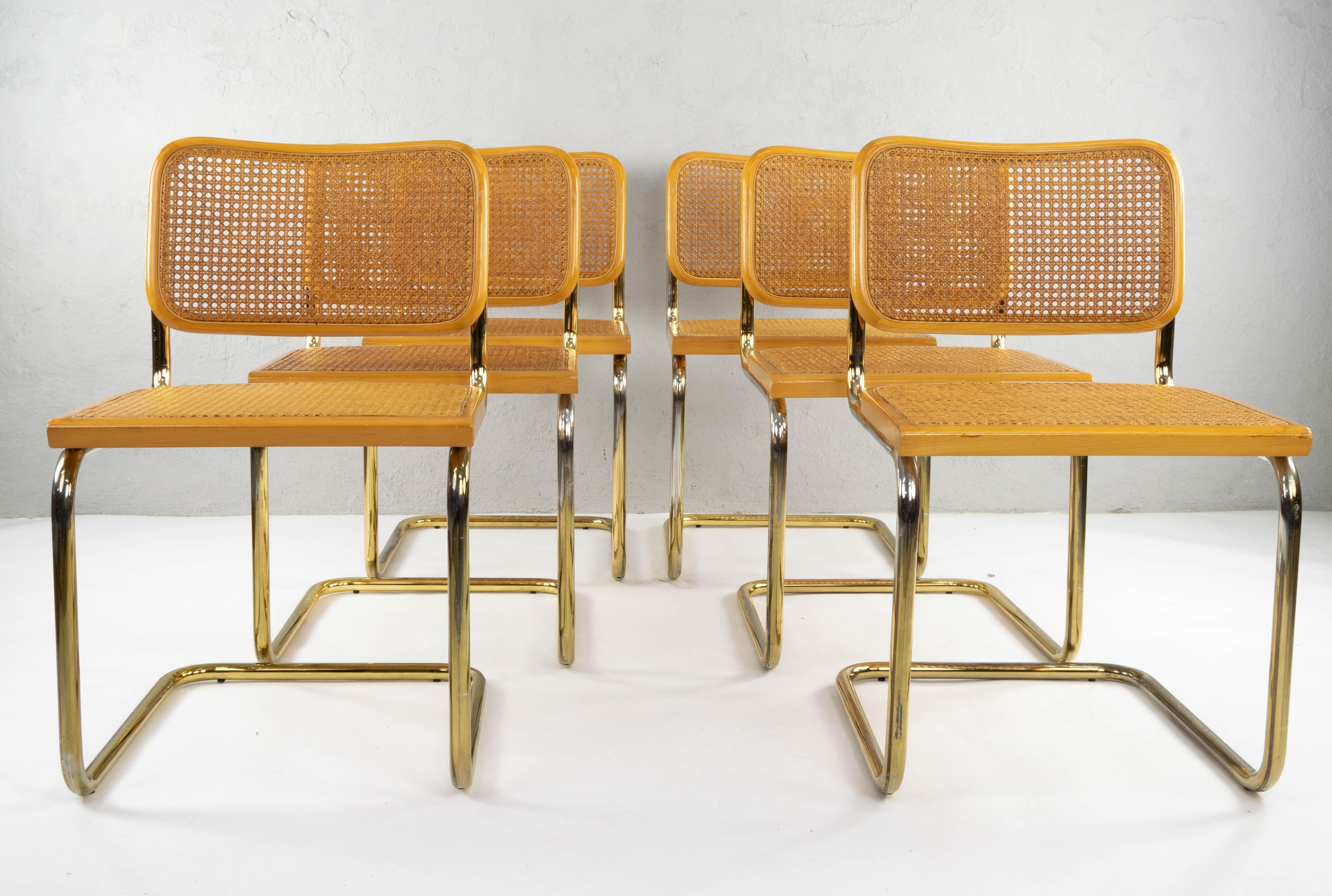 Set of six Cesca chairs model B32, Italy in the 1970s. Brass steel tubular structure. Blonde beech wood frames and Viennese natural grid.
Grids in good condition. The brass has areas of wear as indicated in the images.