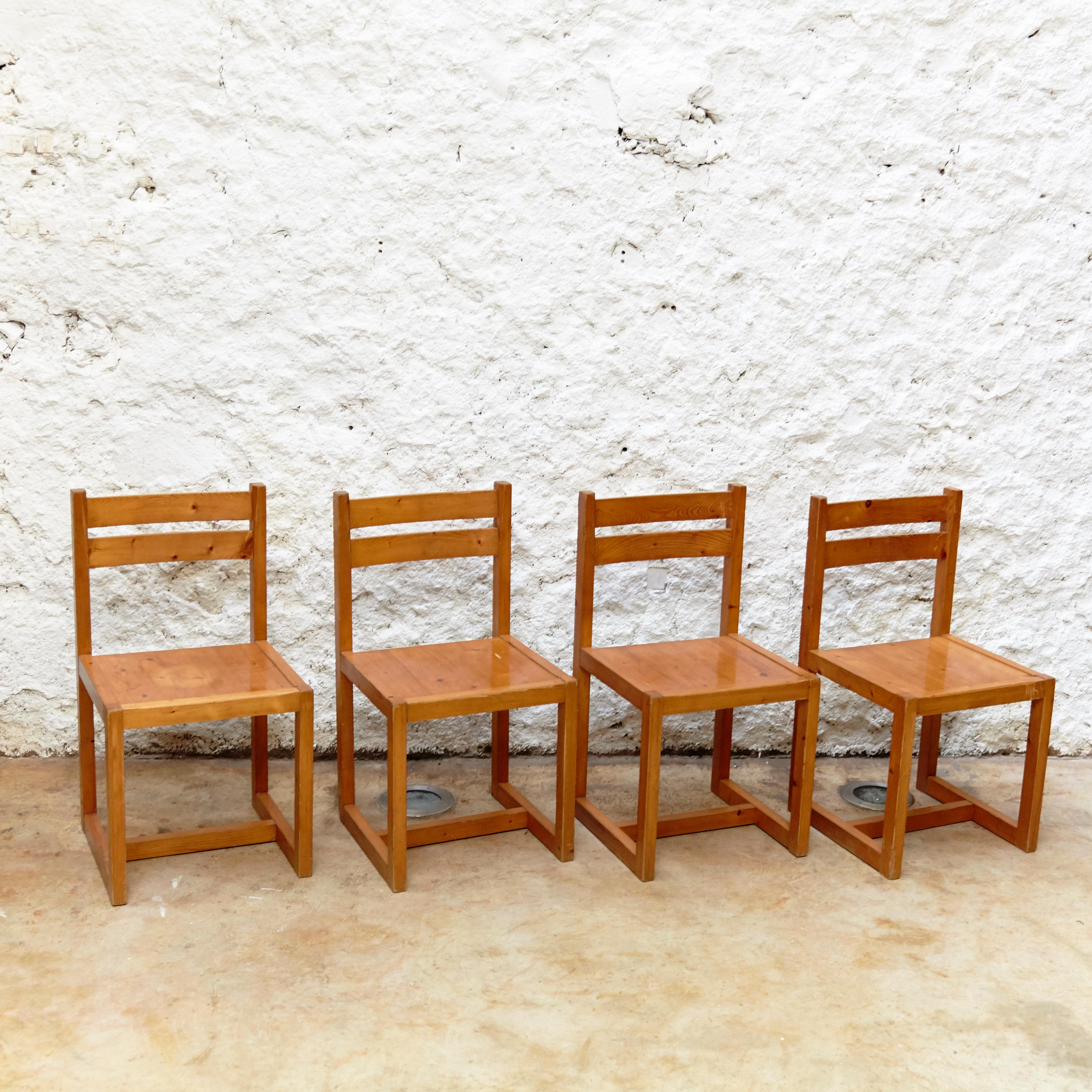 Set of four Mid-Century Modern Racionalist wood chairs from France, circa 1960
By Unknown Designer and Manufacturer.

In good original condition with minor wear consistent of age and use, preserving a beautiful patina.