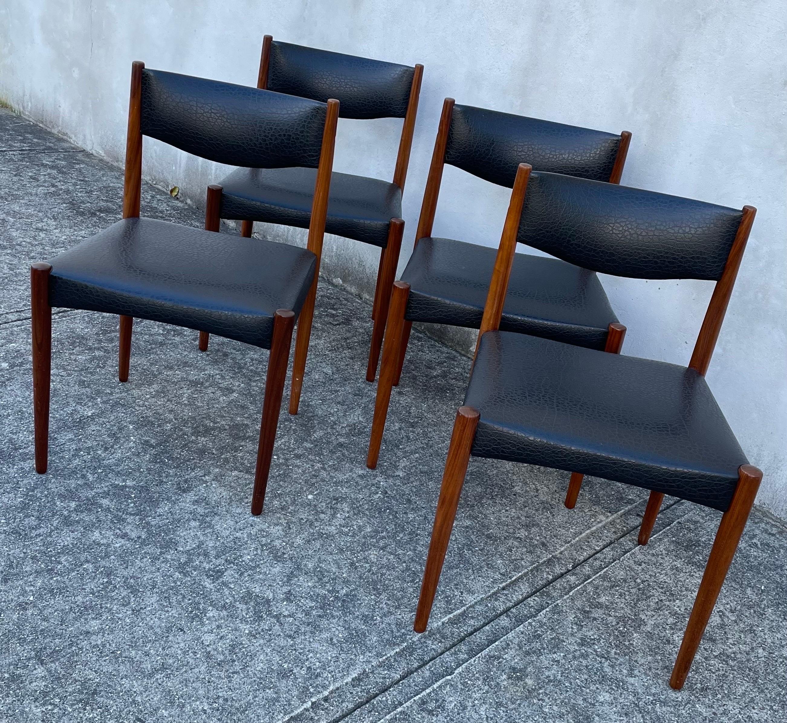Dutch Set of Four Mid-Century Modern Teak Dining Chairs, Faux Black Leather Seats For Sale