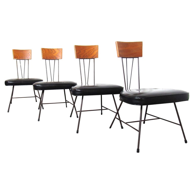 Set of Four Mid-Century Modern Wood & Vinyl Dining Chairs For Sale
