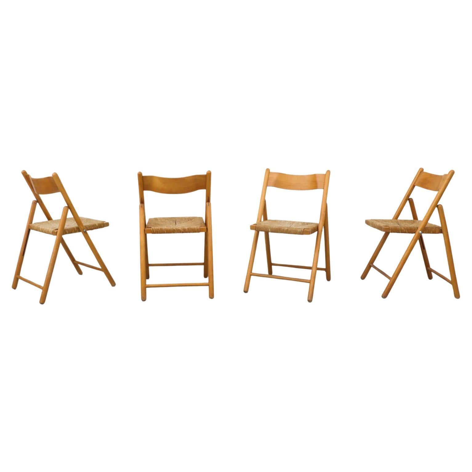 Set of Four Mid-Century Oak Folding Chairs with Curved Backs and Rush Seats
