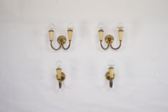 Set of four Mid-Century sconces in lacquer and brass. Italy 1950s