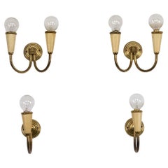 Set of four Mid-Century sconces in lacquer and brass. Italy 1950s