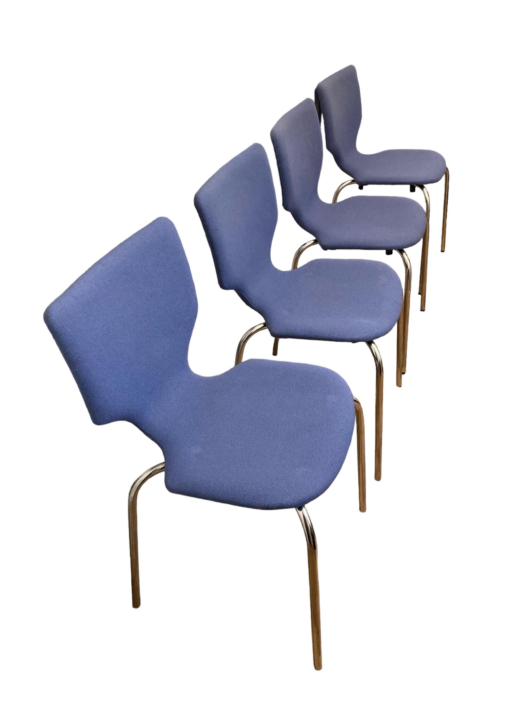 Set of four Danish Duba Mobelindustri Conference or Dining Chairs, beautiful light blue fabric with Chrom legs. An unusual shaped back making these chairs stylish, comfortable with a classic Danish Mid Century look.

H: 79 cm

W: 42 cm

D: 42