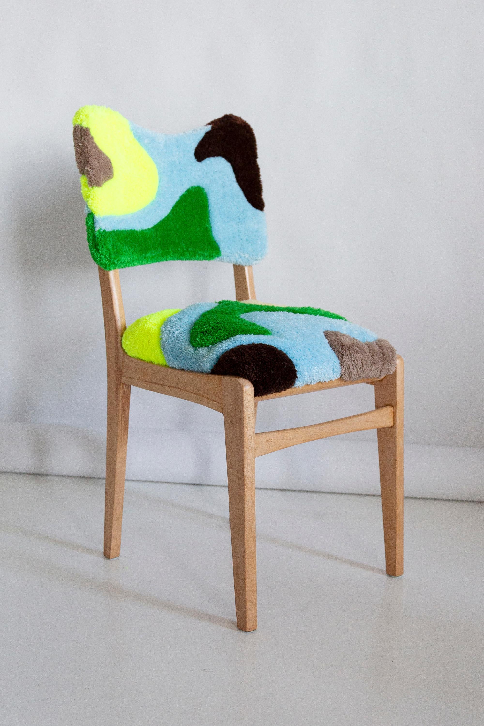 Chair designed by Prof. Rajmund Halas. Made of beechwood. Chair is after a complete upholstery renovation, the woodwork has been refreshed. 

Seat is hand tufting multicolor wool. Absolutely hand made technic. 
Every chair is unique and can be a bit