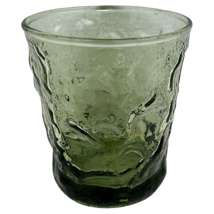 A set of four beautiful green textured glass juice glasses. This set will make a wonderful addition to any breakfast table. Pair them with coordinating floral plates on a green block print tablecloth!

Dimensions:
3
