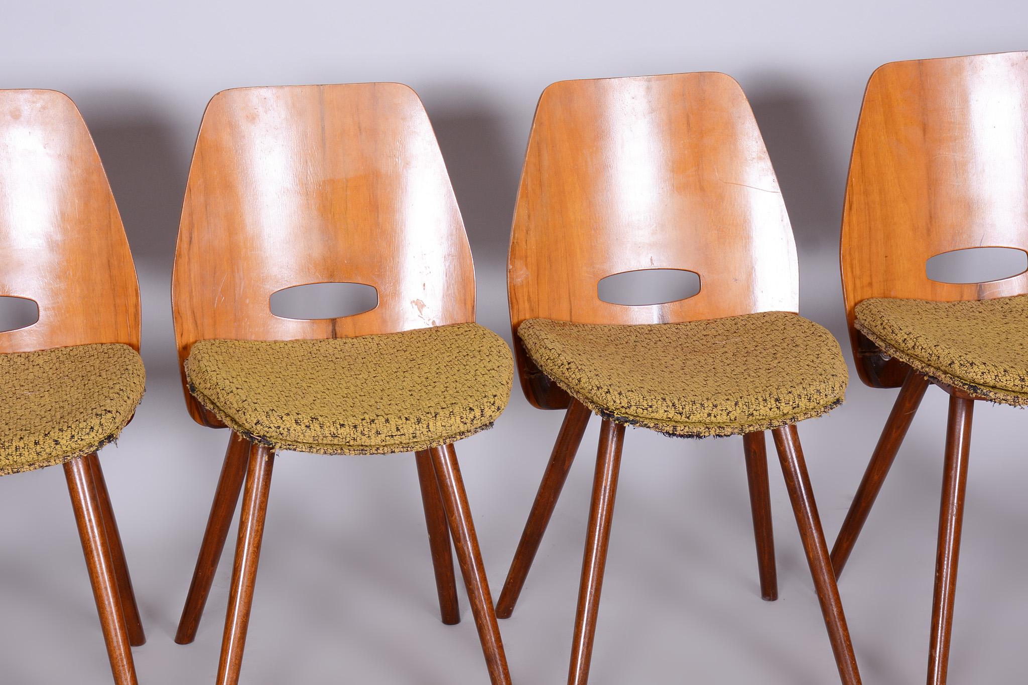 Original Set of Four midcentury walnut chairs by Frantisek Jirak.

Maker: Tatra Nabytok n.p.
Period: 1950-1959
Source: Czechia
Material: Walnut 

Original well-preserved condition. Cleaned upholstery.