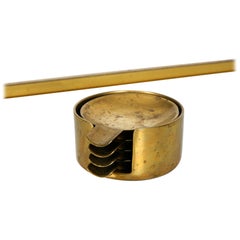 Set of Four Midcentury Brass Ashtrays with Holder