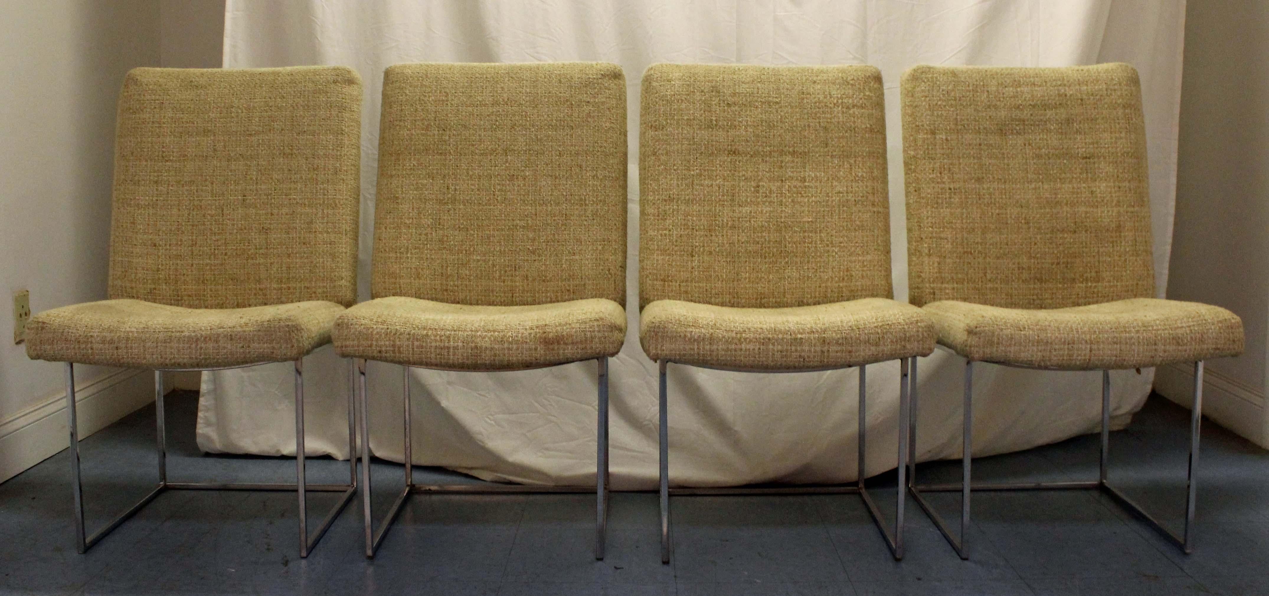 What a find. Offered is a Mid-Century Modern set of four dining chairs, featuring steel square tube chrome frames. This set was designed by Milo Baughman for Thayer Coggin in the 1970s. They are in excellent condition for their age, show some