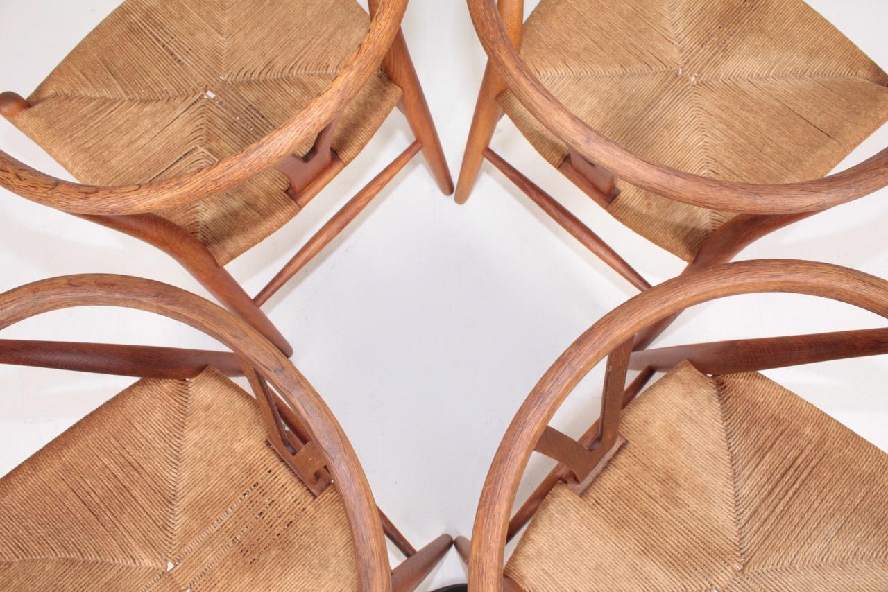 Danish Set of Four Midcentury Wishbone Chairs in Patinated Oak by Hans Wegner, 1960s