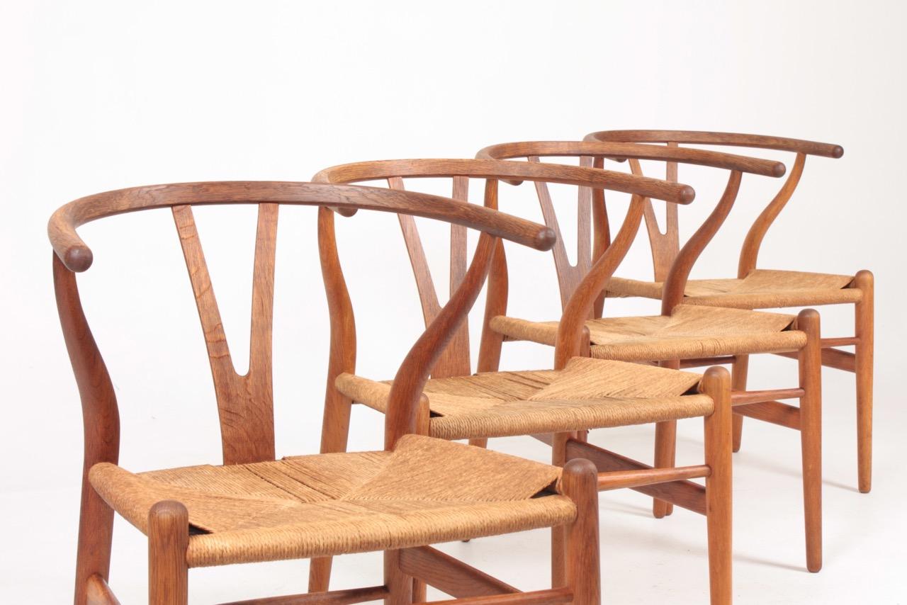 Mid-20th Century Set of Four Midcentury Wishbone Chairs in Patinated Oak by Hans Wegner, 1960s