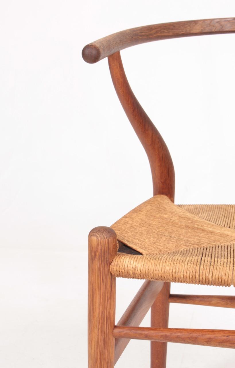 Set of Four Midcentury Wishbone Chairs in Patinated Oak by Hans Wegner, 1960s 1