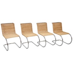 Set of Four Mies van der Rohe Rattan Chairs, circa 1960