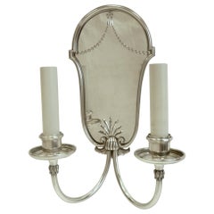 Set of Four Mirrored Back Silver Plated Two-Light Sconces by E. F. Caldwell