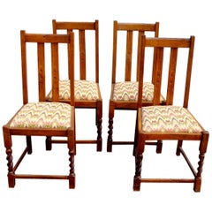 Antique Set of Four Mission Style Oak Chairs with a Twist