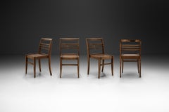 Set di quattro sedie da pranzo in Oak modello "103" di René Gabriel, Francia, XX secolo