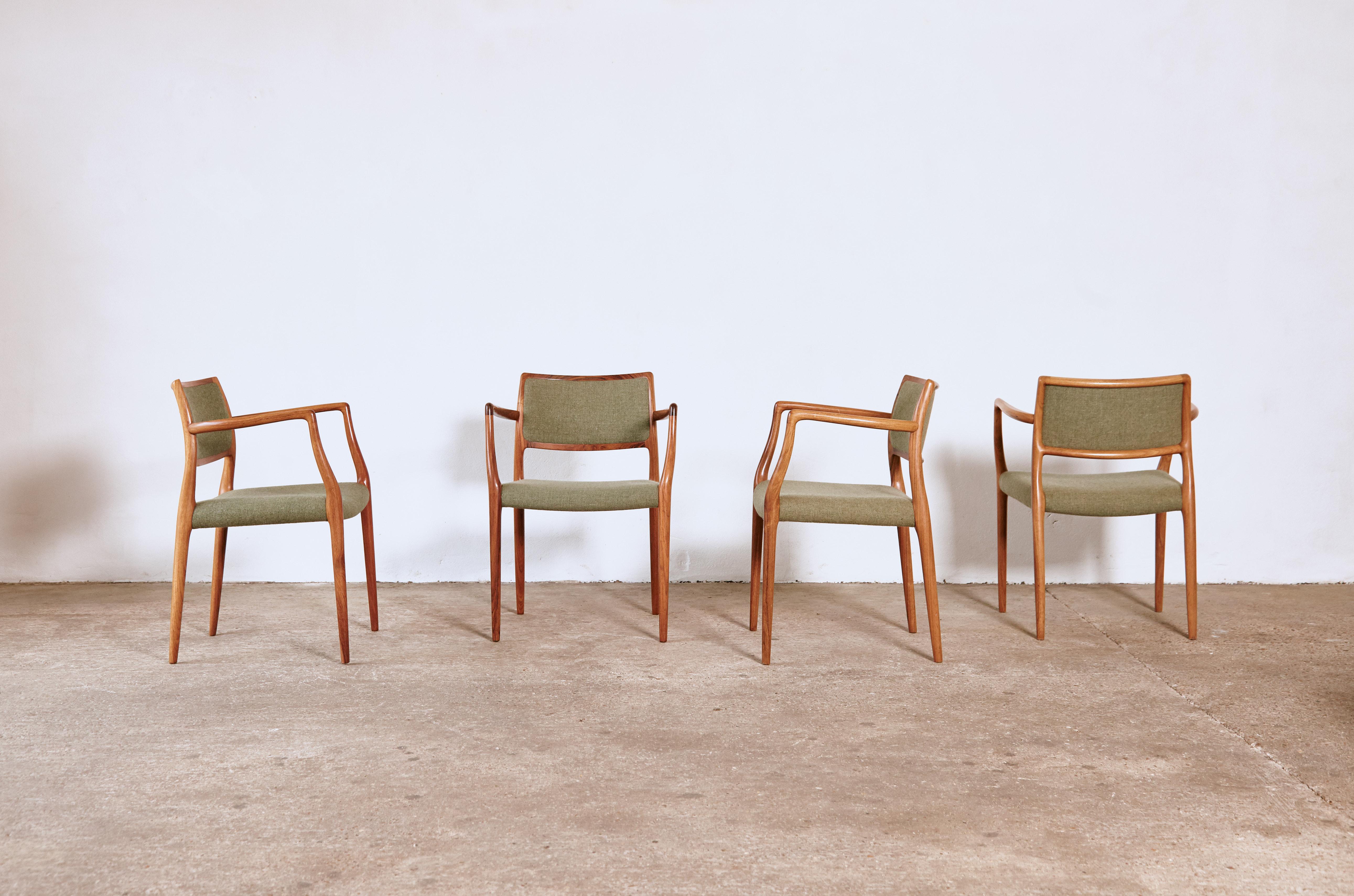 A superb set of four N.O. Møller (Moller) model 65 dining chairs, in very good original condition, with original green wool fabric. Designed in 1962 for J.L. Møllers Møbelfabrik, Denmark.   Fast shipping worldwide.




 
  