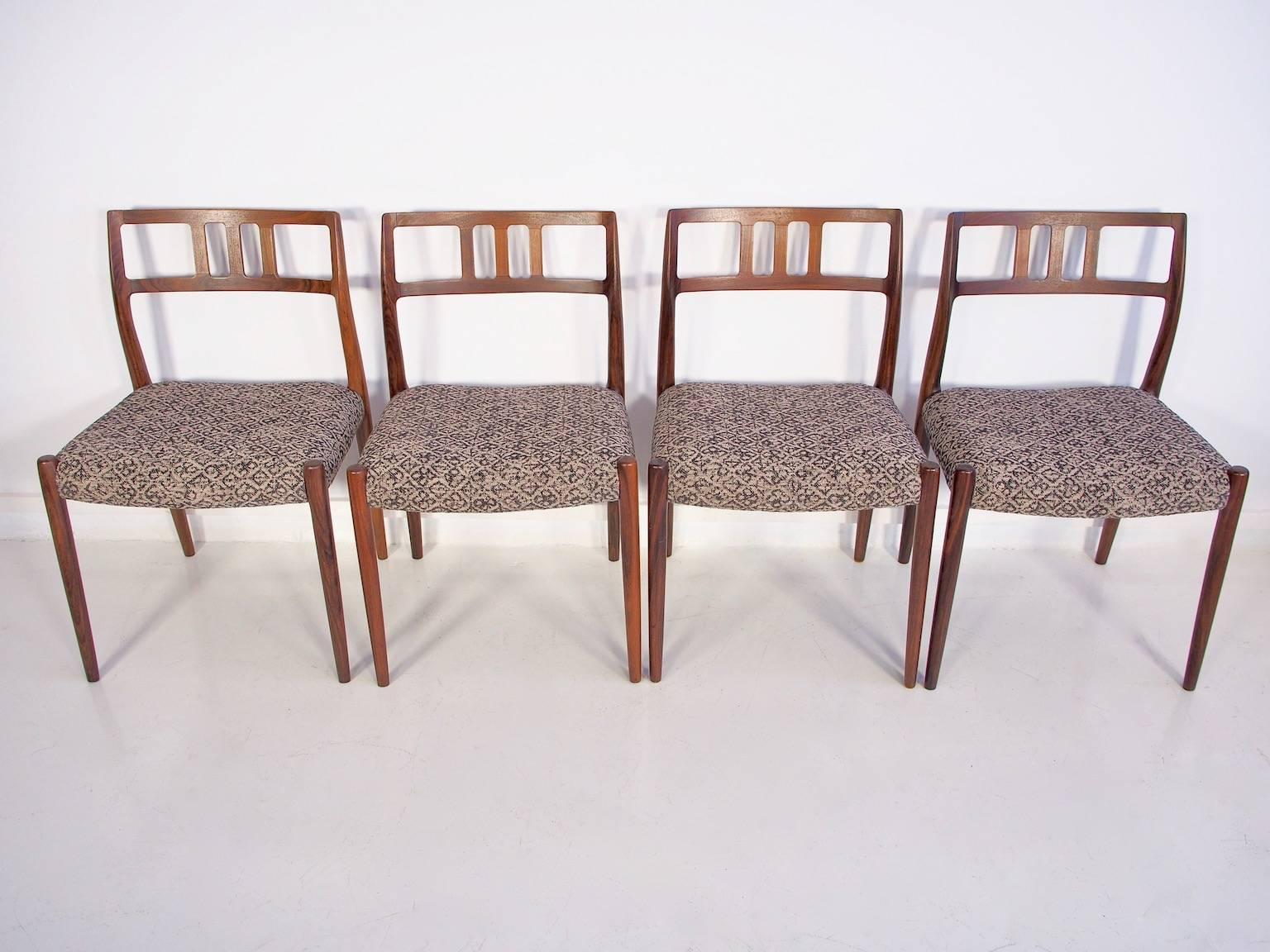 This set of four Niels O. Møller hardwood chairs has been recently reupholstered and restored. Model 79 designed in 1966 and produced by J.L. Møller.