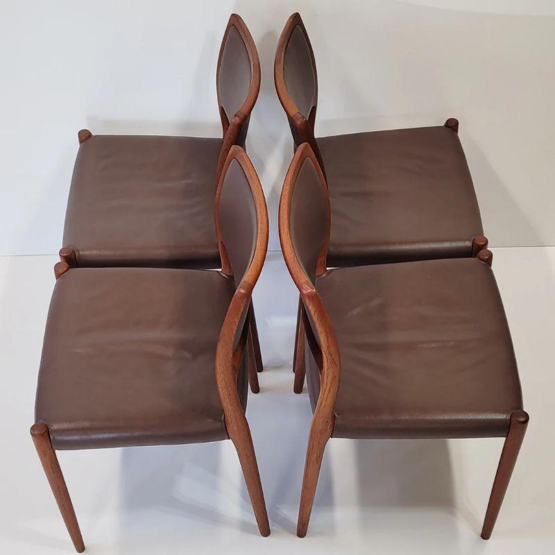 Set of four model 80 dining chairs in solid teak with a rich brown coloured leather. Designed by Niels Otto Møller and manufactured by J. L. Møller factory in the 1960s. 

In fantastic condition, with minor age related markings and signs of use.

We