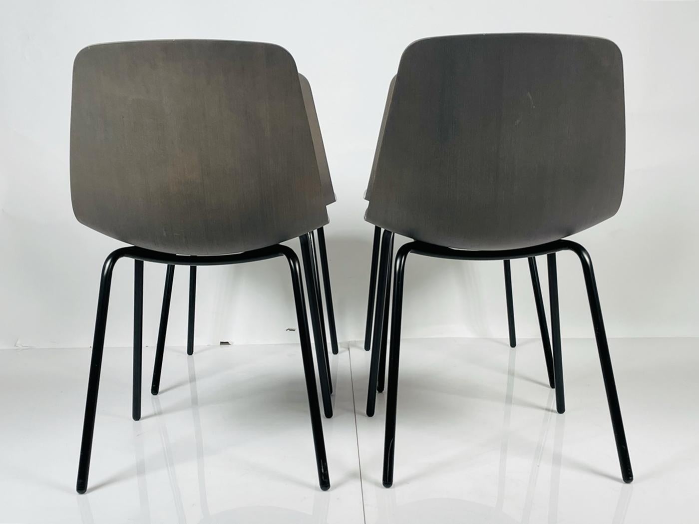 Powder-Coated Set of Four Modern Chairs with Molded Seats and Black Metal Frames For Sale
