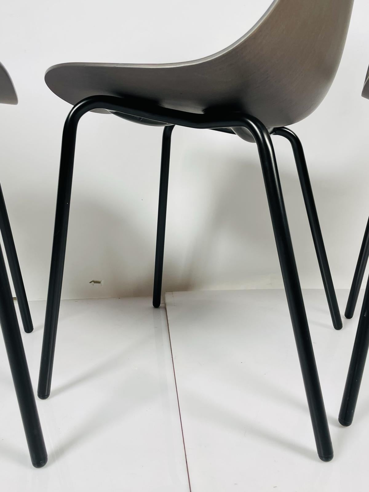 Set of Four Modern Chairs with Molded Seats and Black Metal Frames For Sale 1