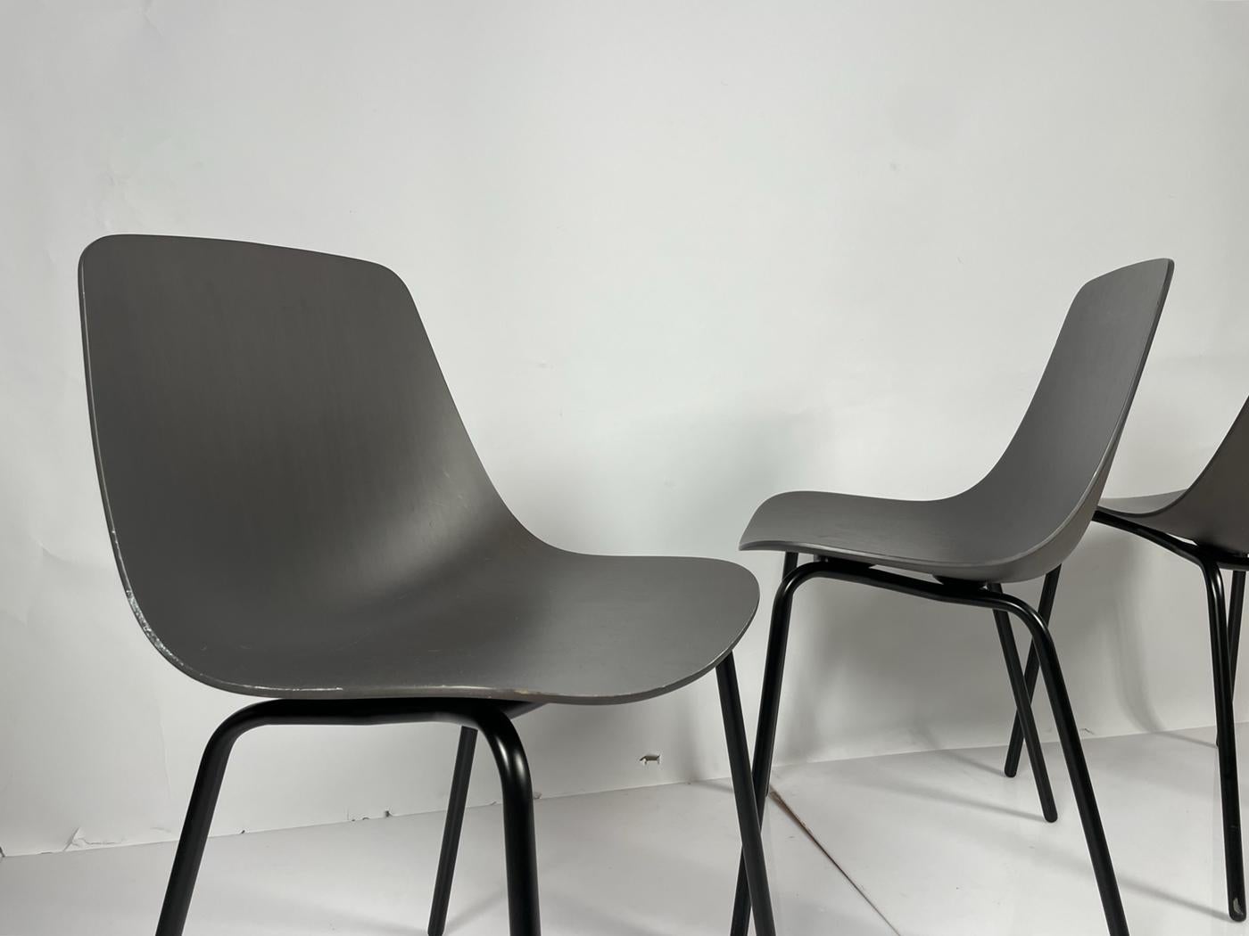 Set of Four Modern Chairs with Molded Seats and Black Metal Frames For Sale 2