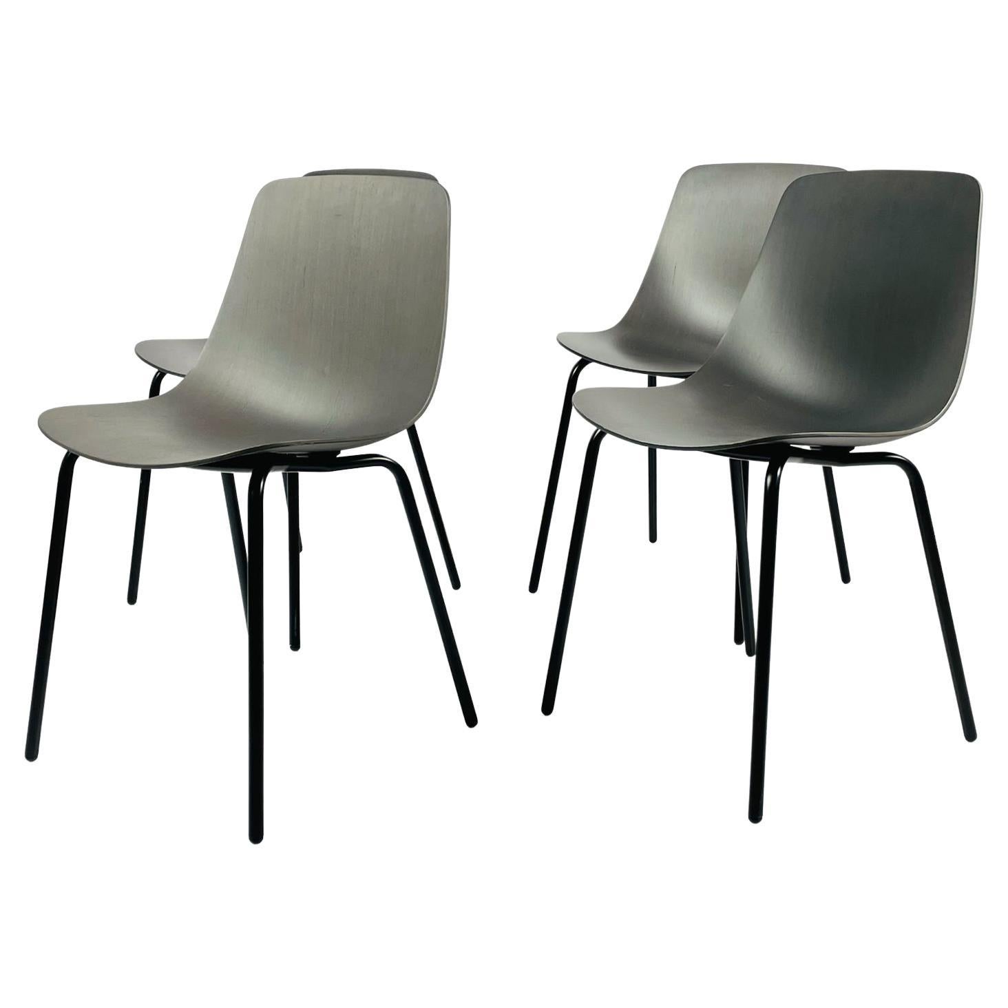 Set of Four Modern Chairs with Molded Seats and Black Metal Frames For Sale