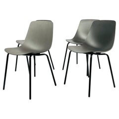 Set of Four Modern Chairs with Molded Seats and Black Metal Frames