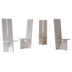 Set of four Modernist dining chairs with high backs from the 1950s.