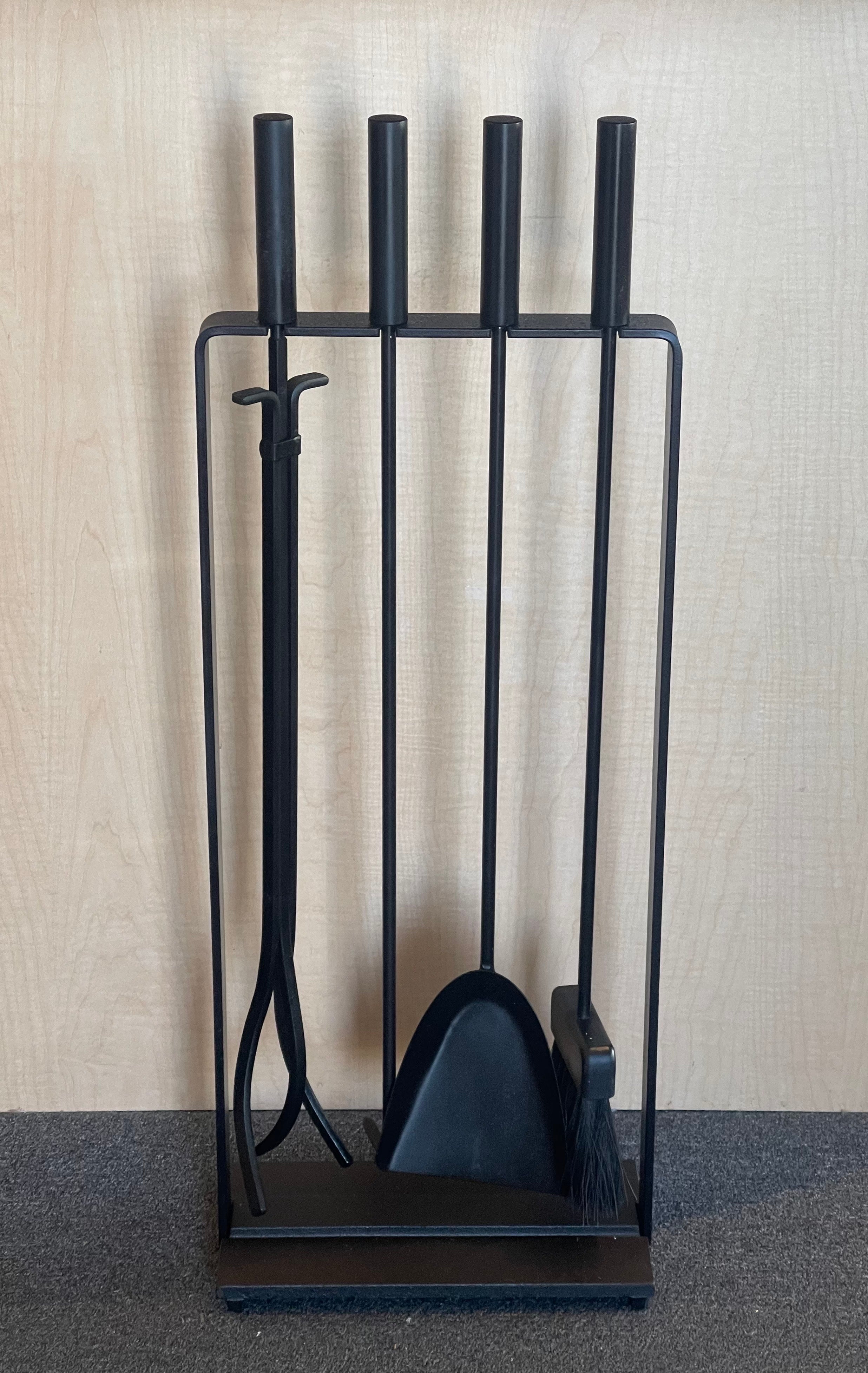 A really nice set of four modernist fireplace tools with stand by Pilgrim Manufacturing, circa 1970s. There are four tools (shovel, brush, log holder and poker) and a single stand in good vintage condition. The set is very heavy and well made; it
