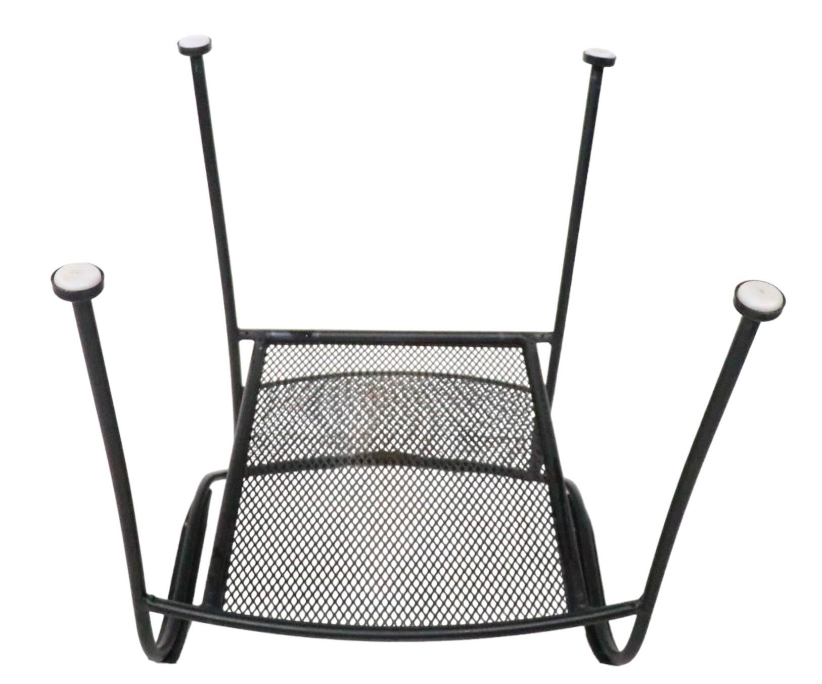 Nice clean set of Post Modern outdoor metal dining chairs, in the style of Woodard. The chairs feature tubular metal frames, with flat bar armrests, and metal mesh seats and backrests. All four are in excellent , clean, original, ready to use