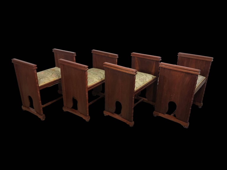 20th century set of four rectangular upholstered window benches with arms in Art Decó style in mahogany.