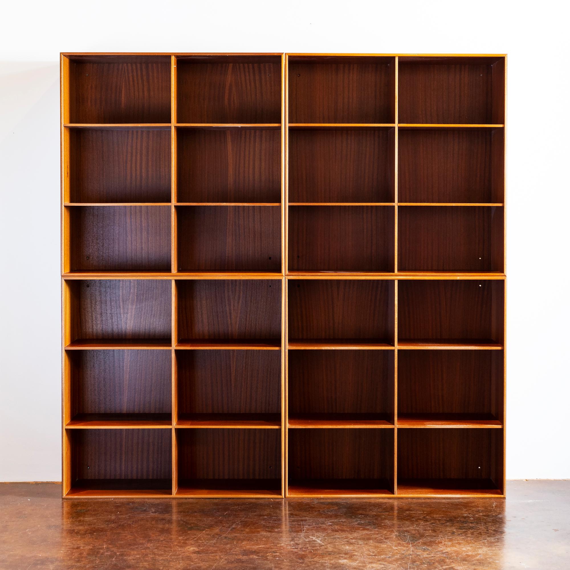 Four Mogens Koch stackable wall units in solid mahogany. Manufactured by Rud. Rasmusssen, Denmark, 1960s.