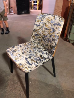Set of Four Montis Back Me Up Chairs