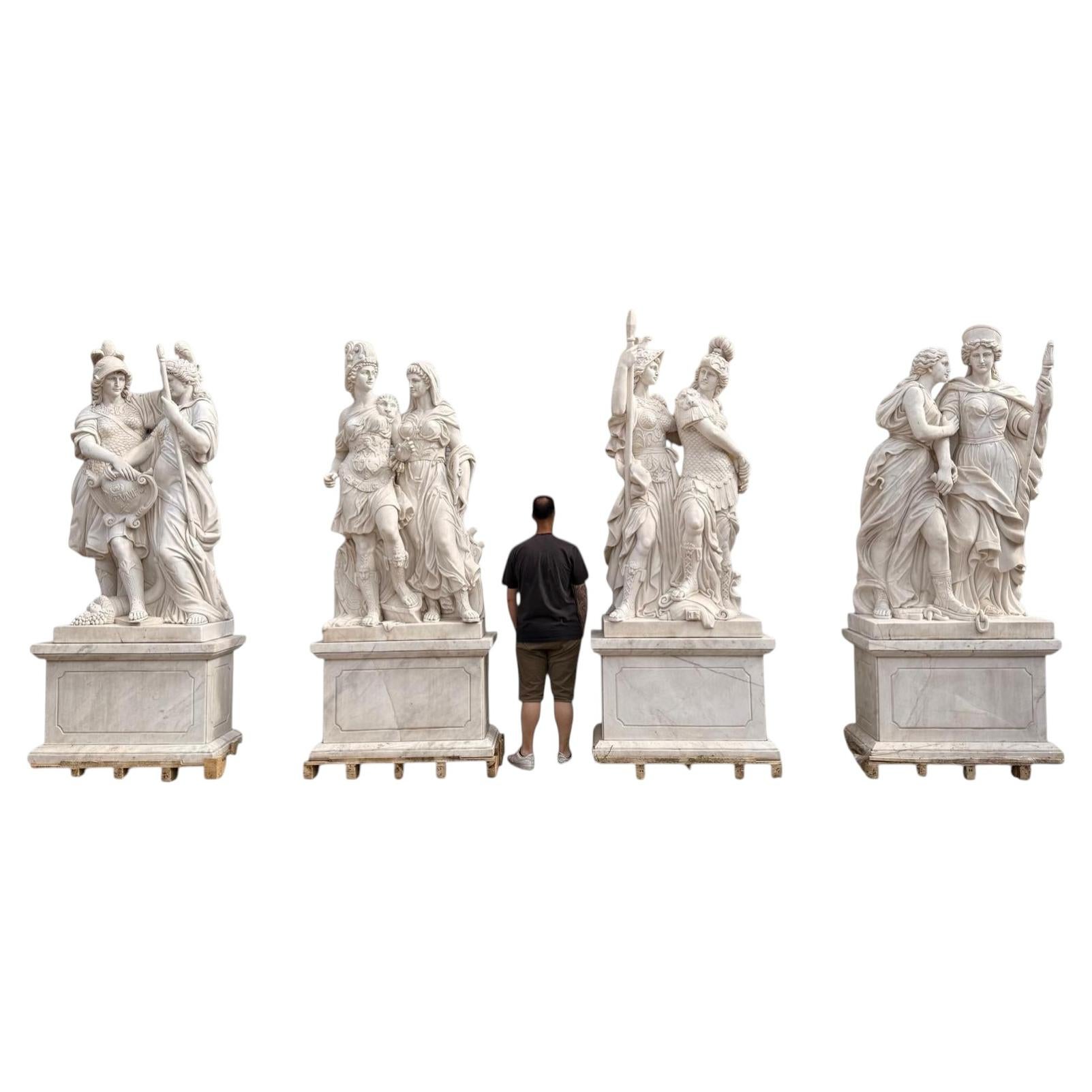 Set di quattro sculture monumentali di guerrieri greco-romani in marmo italiano, anni '90