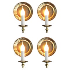 Set of Four ‘Moon’ Round Brass Wall Light Sconces C1970s France. Used Set of Four ‘Moon’ Round Brass Wall Light Sconces C1970s France.