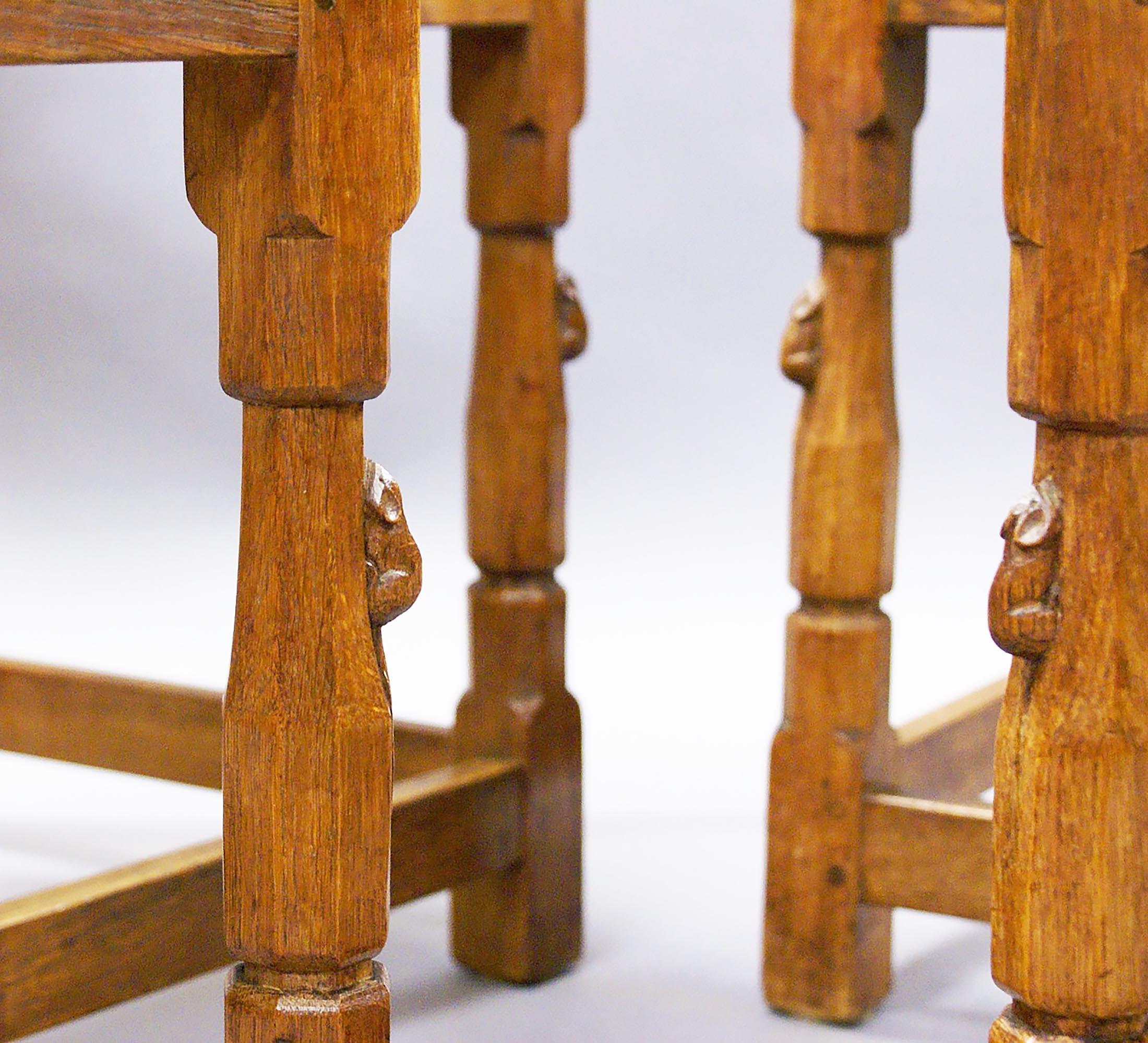 This unadorned yet very attractive set of four oak side chairs were made by Robert Thompson, a prolific and well-known furniture maker of the period. A small carved mouse was his signature and trademark, which eventually became his nickname.
Robert