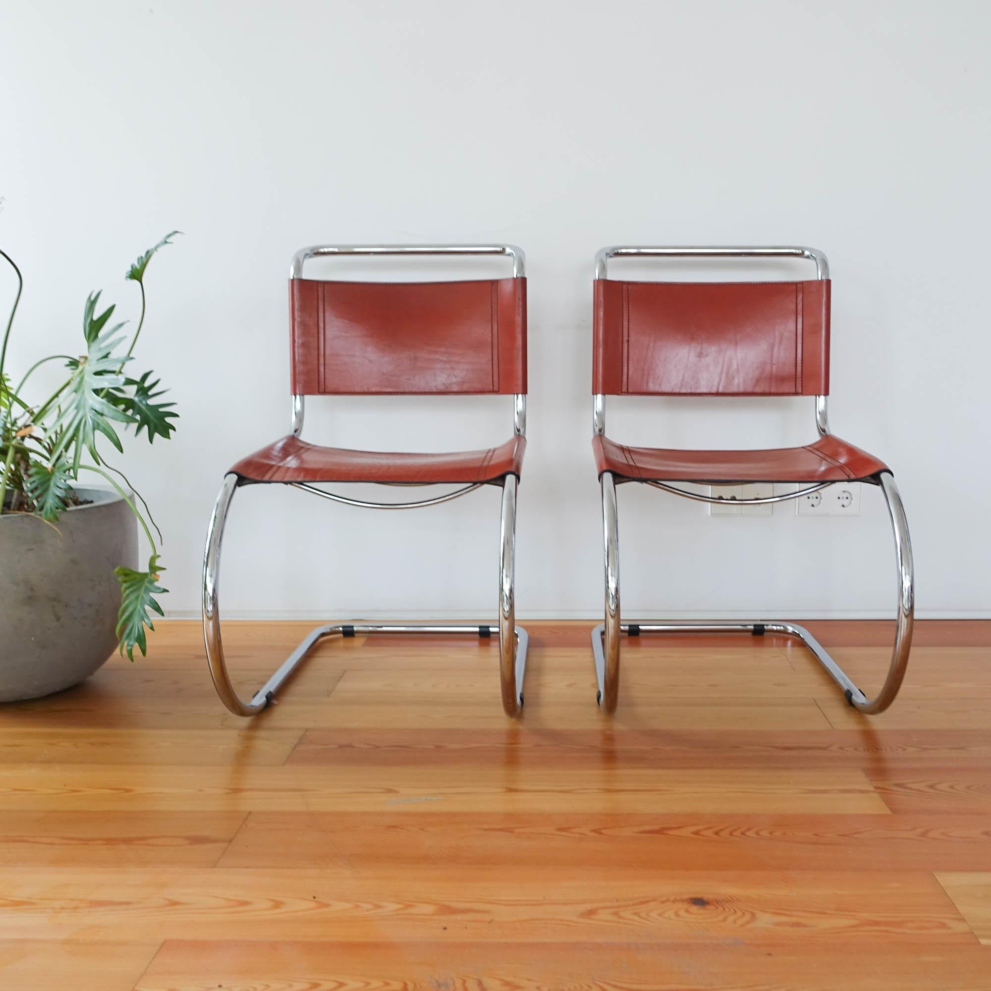 This set of four MR10 cantilever chairs, were designed by Ludwig Mies van der Rohe circa 1930 and crafted by an unknown manufacturer in Italy around 1970's. Inspired by Marcel Breuer's chairs, Mies van der Rohe replaced the right angles on the front