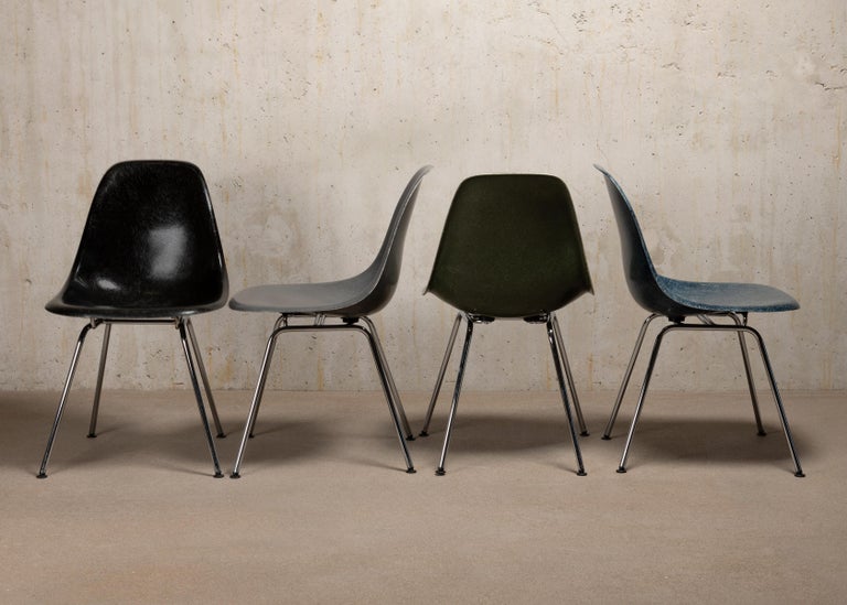 Iconic set of Charles & Ray Eames DSX chairs in colors: black, elephant hide grey, olive green dark and navy blue. The shells are in very good condition with slight traces of use. Replaced shock mounts which guarantee save usability for the next