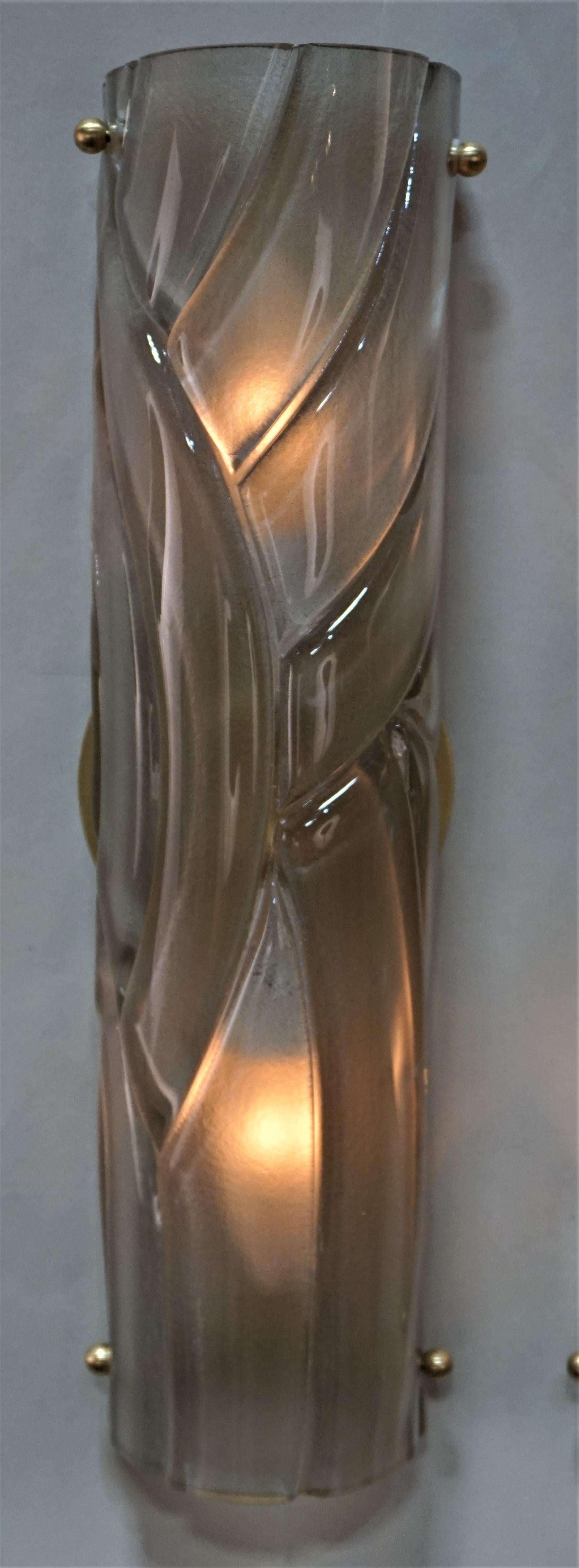 Set of four smoked color blown glass wall sconces
Priced individually, sold in pairs.