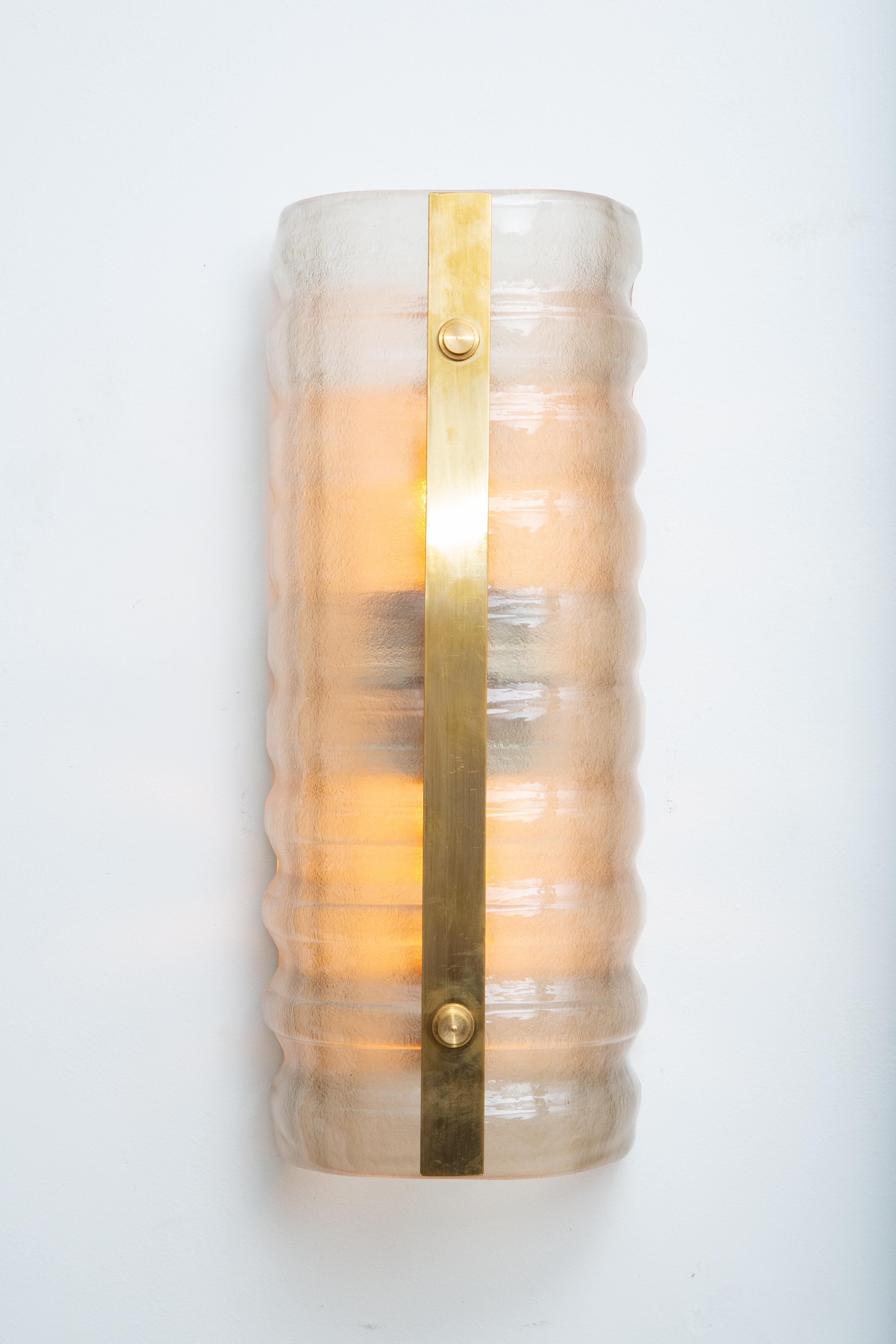 Set of four Murano smoked glass and brass wall lights, in stock
Undulating textured thick light smoked glass.
Brass accents
Wired to the America standard
Available to view in-situ in our Miami gallery