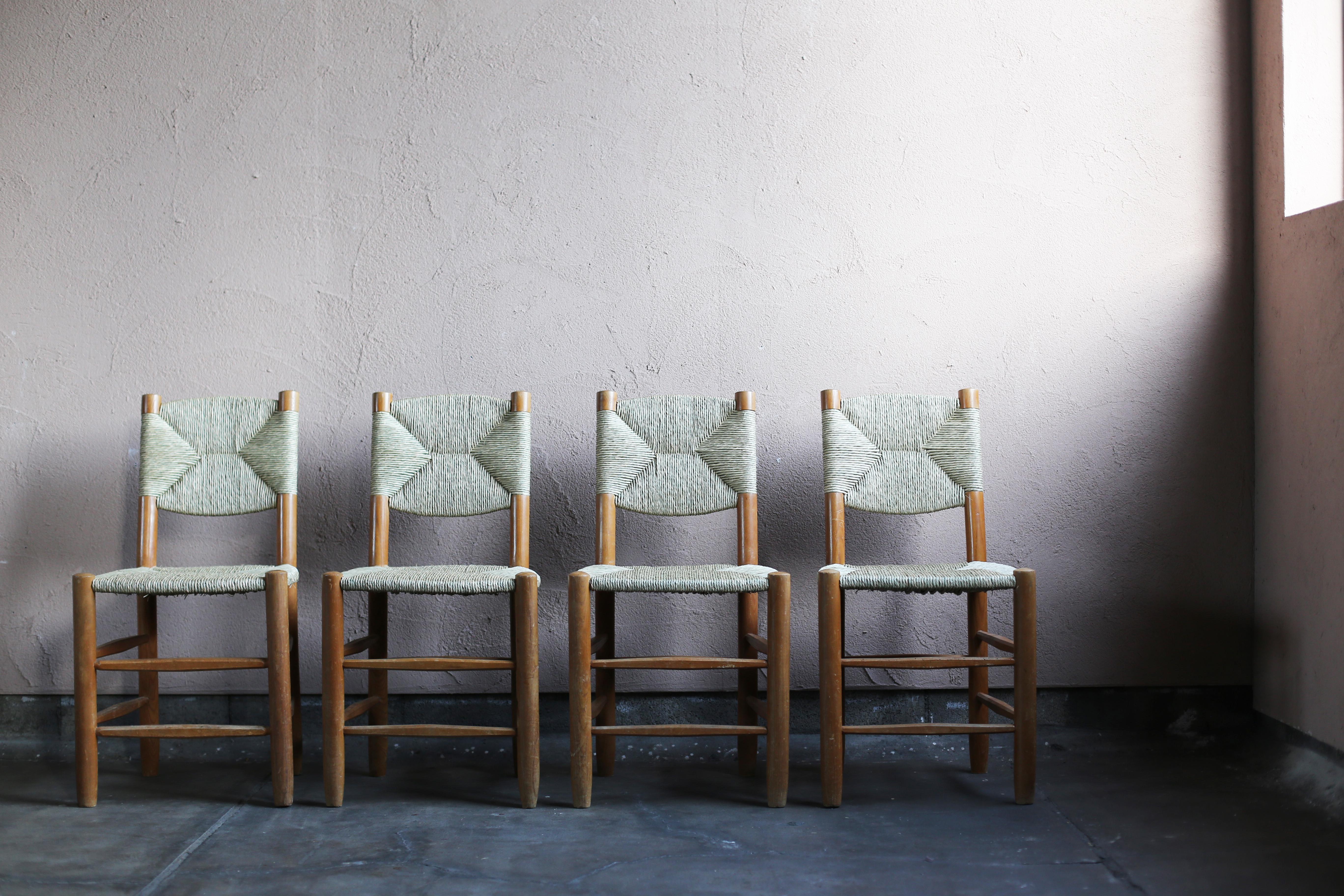 Size :  W420 D400 H820 SH450 mm

Set of Four n°19 Chairs by Charlotte Perriand.
Designed by Charlotte Perriand, produced in the 1950s and 1960s and manufactured by Sentou. The rushes have been newly reupholstered.