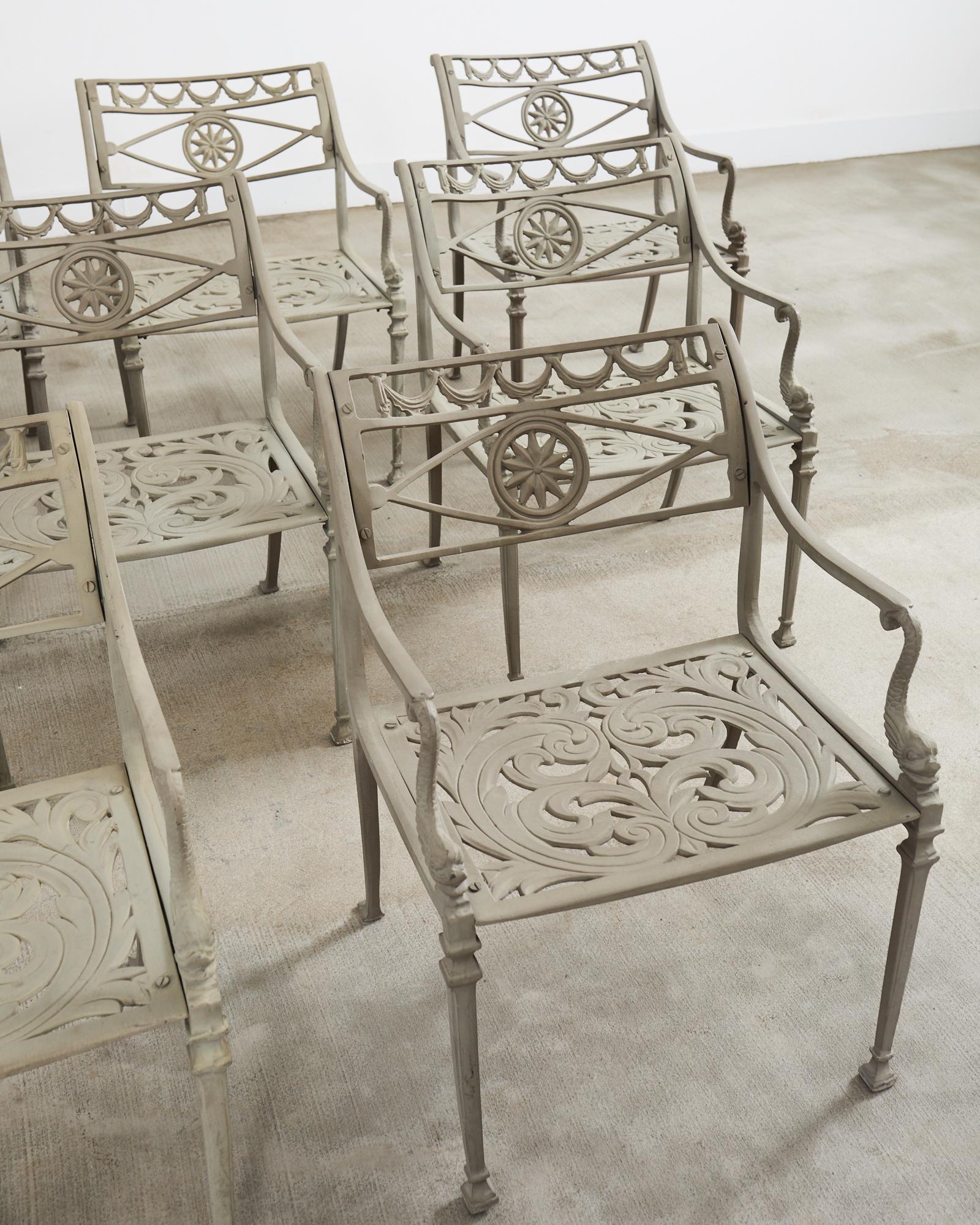 Cast Set of Four Neoclassical Dolphin and Star Garden Dining Armchairs